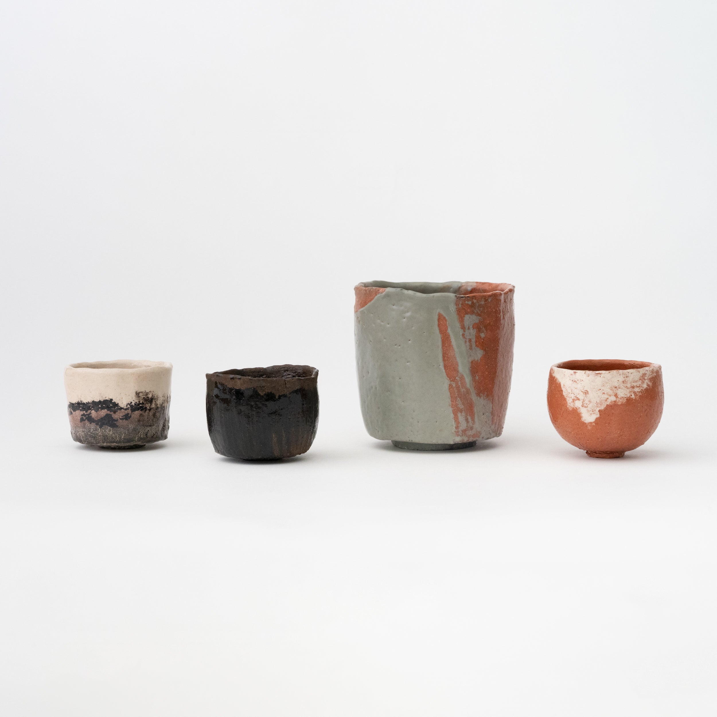 Katami-gawari Tea Bowl (Celadon & Red Raku) / Hideki Yanashita