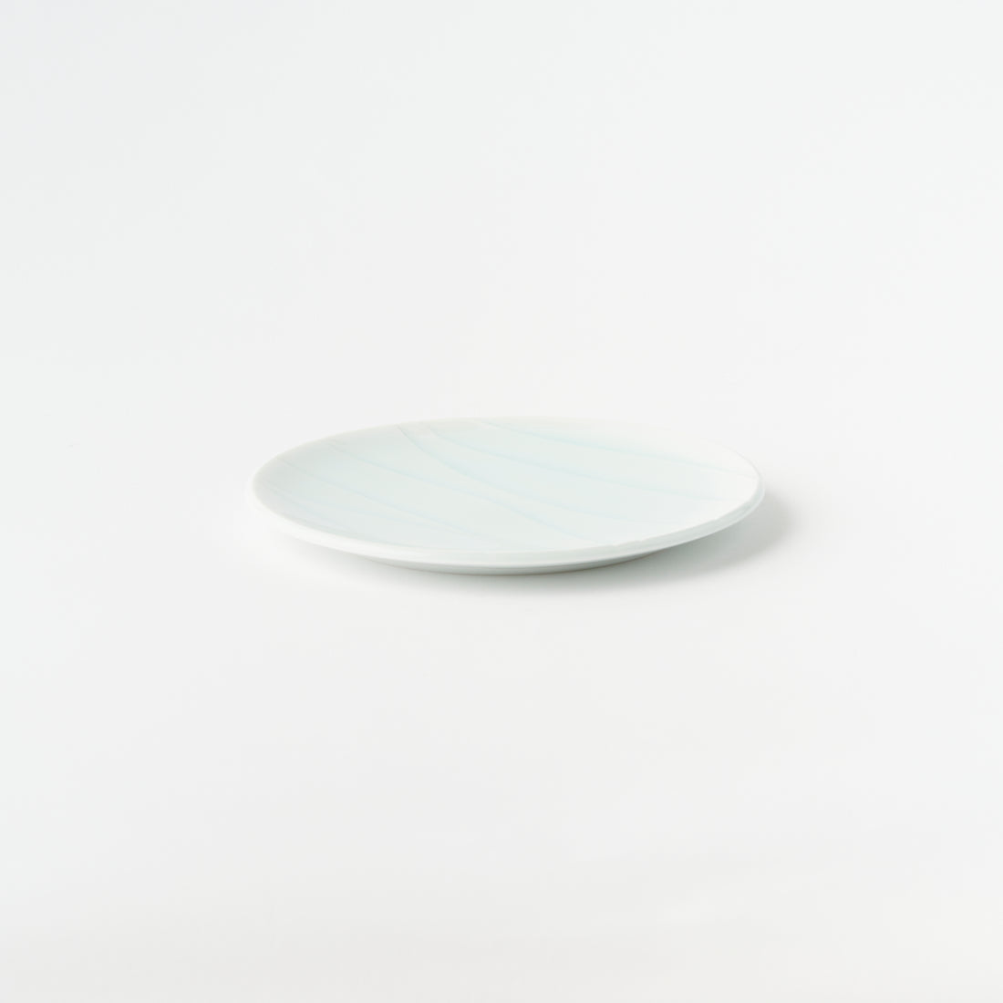 Swayed Plate / Hiroshi Taruta