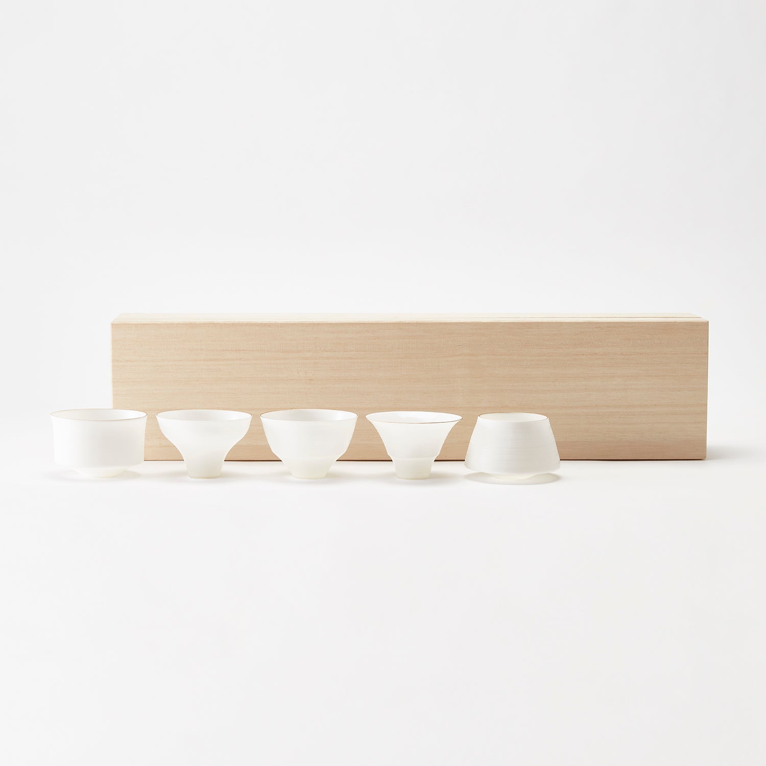 Egg Shell Sake Cup Set. White, thin porcelain as thin as egg shells. Comes with wooden box.